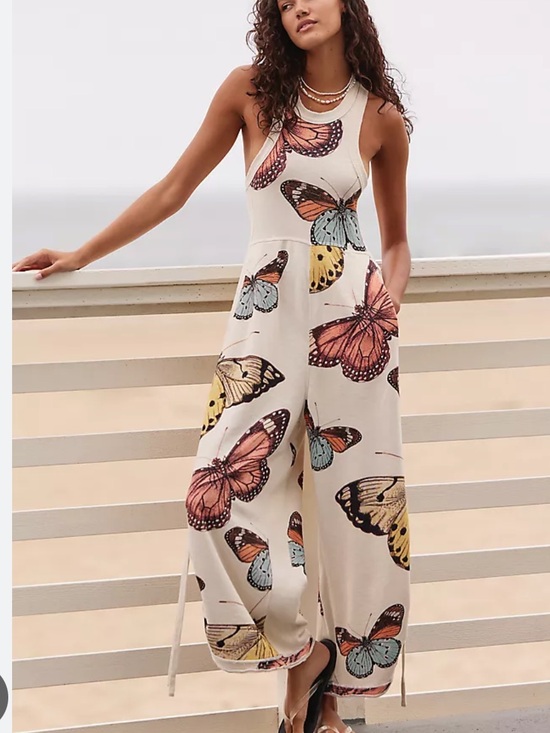 Anthropologie Pants - Anthropologie butterfly print Sleeveless Cream slouchy Jumpsuit large
